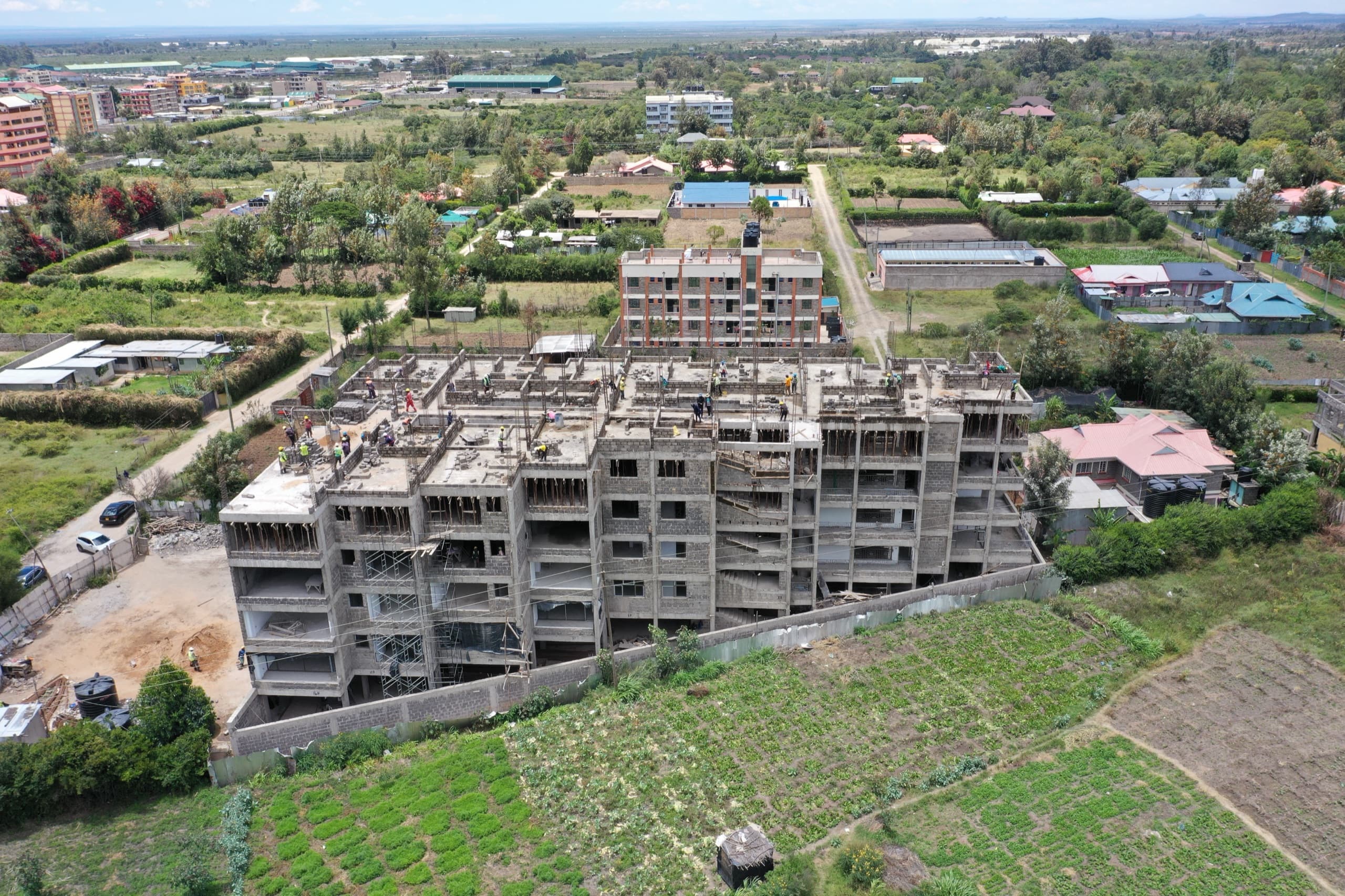 Aerial view of the Naples by KCiti site and early concrete structure, December 2025